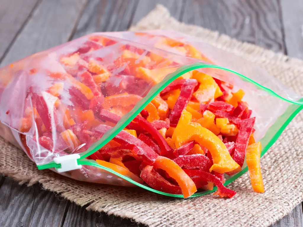 If you can't freeze peppers on a baking sheet first, clean and thoroughly dry the prepared peppers before putting them directly in a freezer bag.
