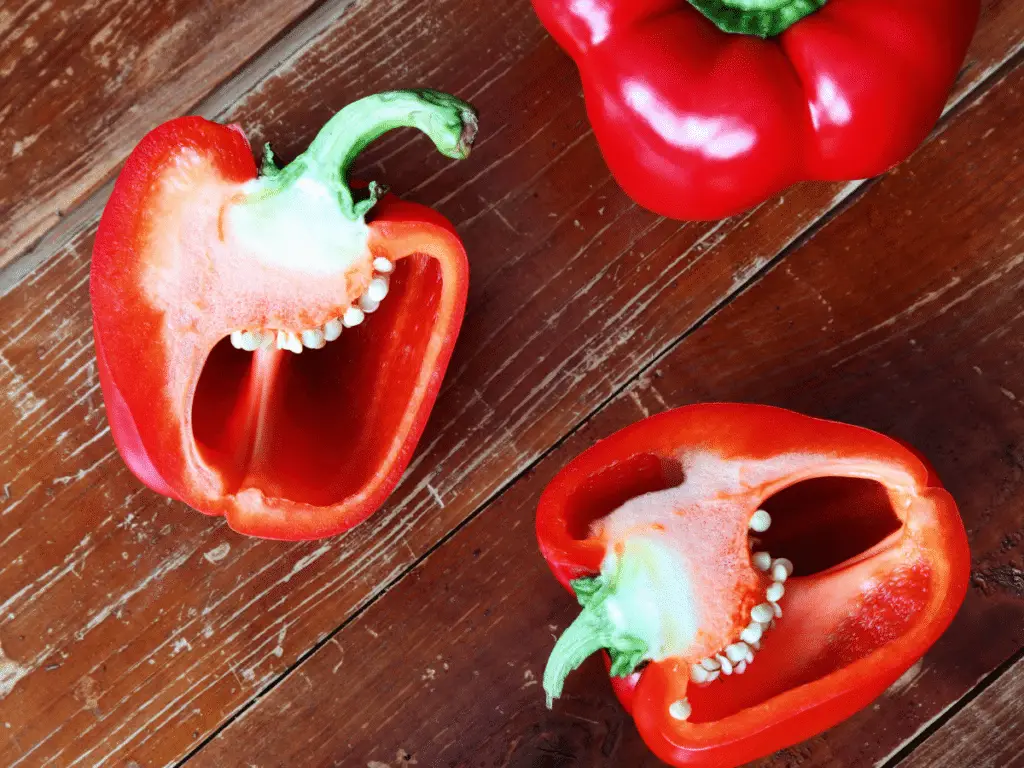 Leaving the stem and seeds in a cut pepper helps it stay fresh and crisp for longer.