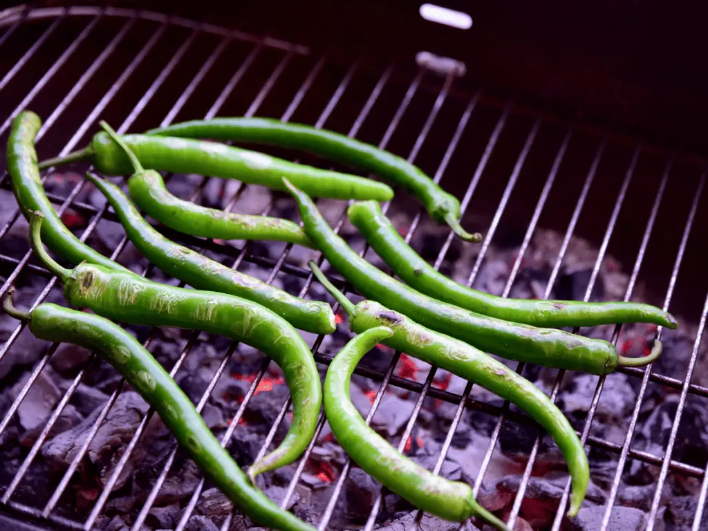 Blistering peppers on a grill gives them a smokiness and depth of flavor that is unrivaled by the other preparation methods.