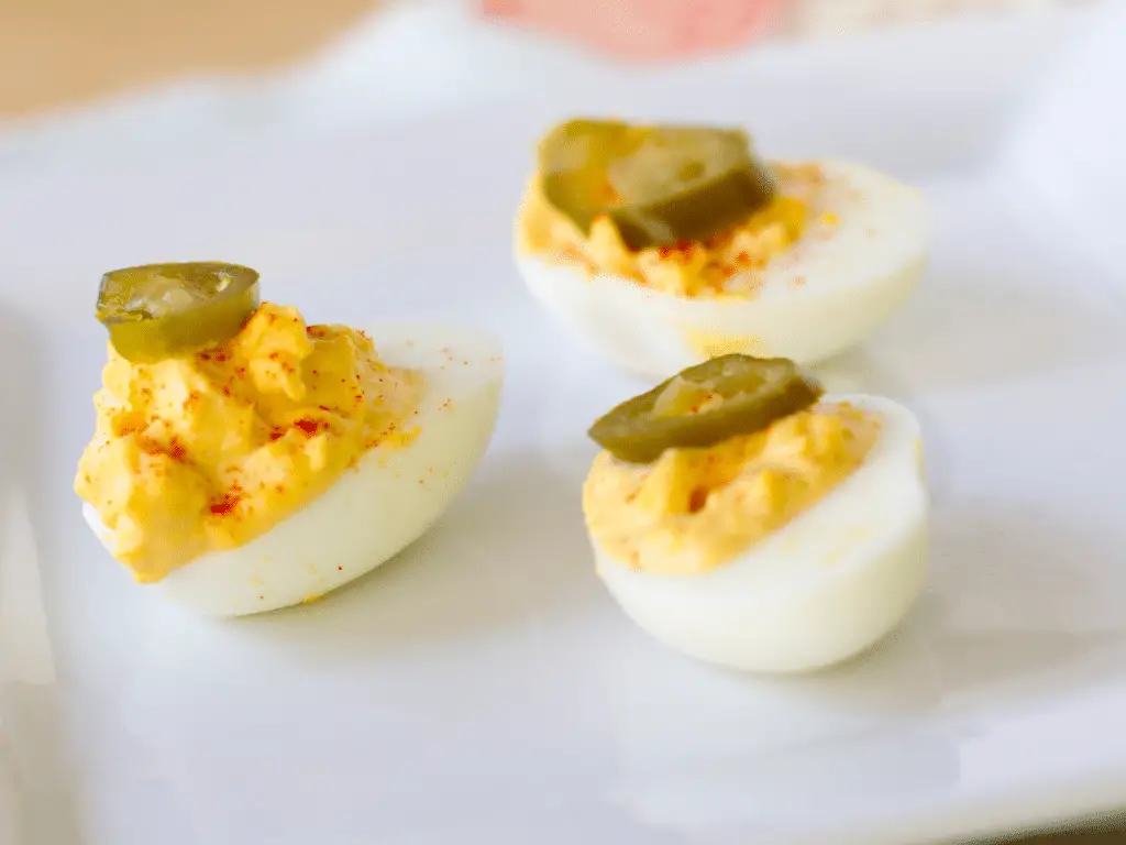 Pickled jalapeños bring a little extra salt, sweetness, and spice to classic deviled eggs.