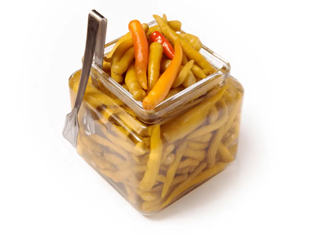 Banana peppers are typically pickled and used as a topping or garnish rather than served by themselves.
