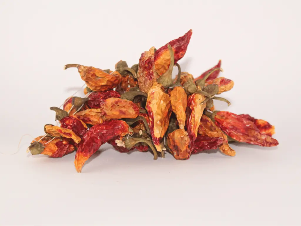Chipotle peppers are red jalapeños that have been hung and smoked until completely dehydrated.